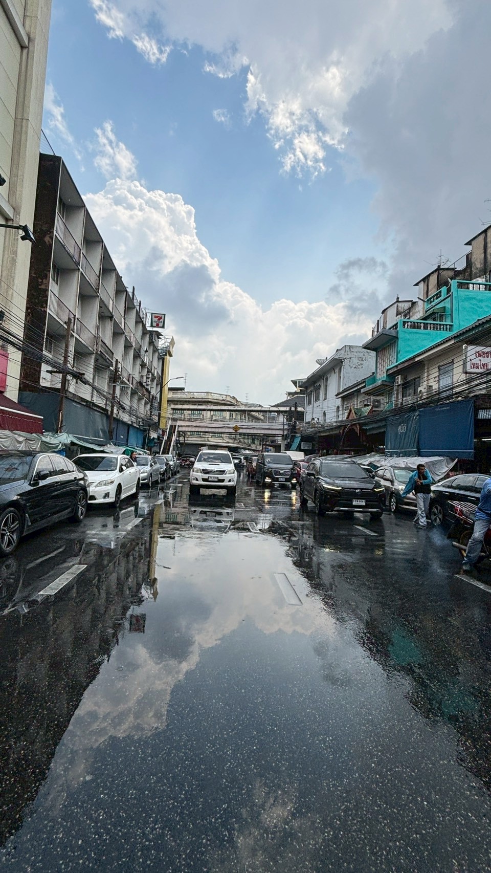 Recording street and traffic conditions after rain to understand movement and access.